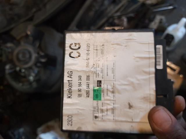 Блок управления центральным замком General Motors 90564349