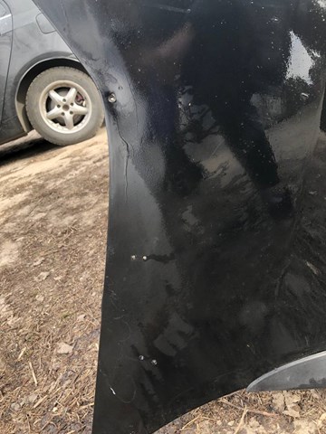 Задний бампер 1018005772 Geely