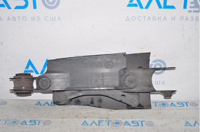 Рычаг задней подвески поперечный левый TK4928550F Mazda