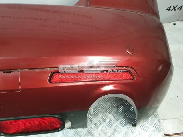 BN8P515M0B Mazda retrorrefletor (refletor do pára-choque traseiro esquerdo)