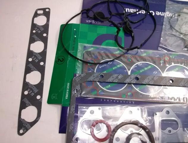 Верхний комплект прокладок двигателя Parts-Mall PFCN014 цена, от 36.99 USD