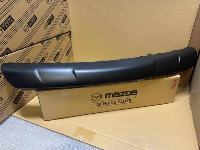 VA40501T4 Mazda Губа переднего бампера
