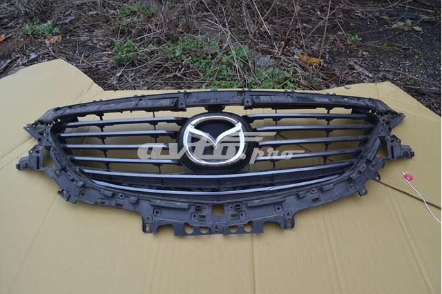 Купить G46M50716 Mazda Эмблема решетки радиатора