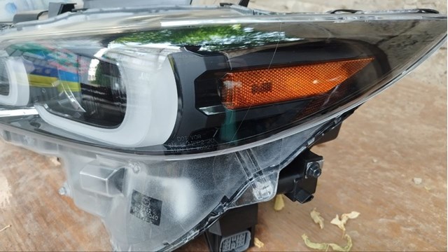 Левая фара KPF351040 Mazda