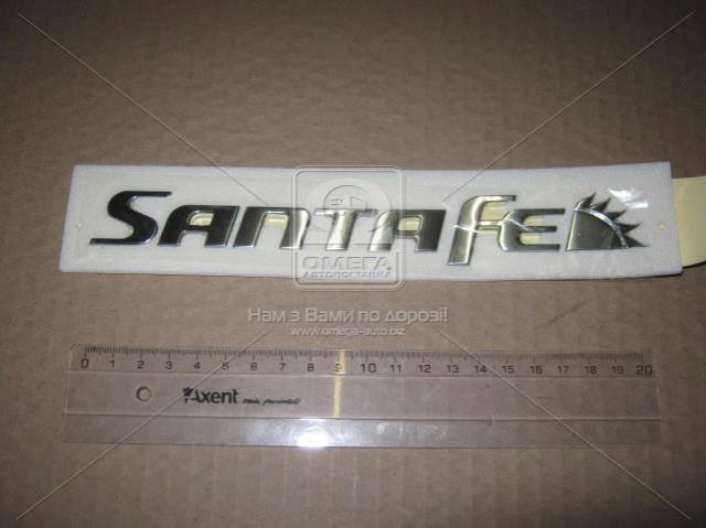 Эмблема крышки багажника (фирменный значок) на Hyundai Santa Fe II 