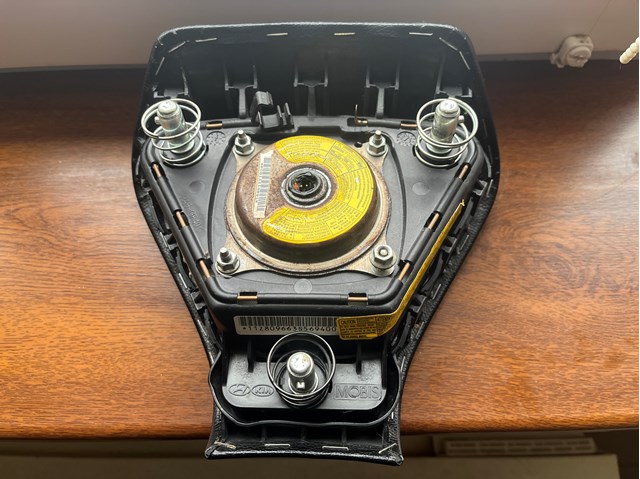 Подушка безопасности водителя 569004R100HZ Hyundai/Kia