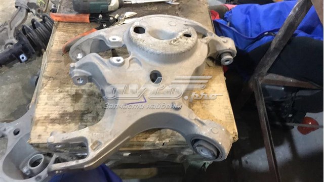 DG9Z5500C Ford braço oscilante inferior esquerdo de suspensão traseira