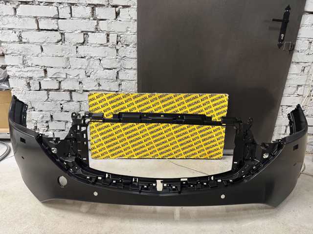 Бампер на авто Mazda KSD750031A8P цена, от 660.12 USD