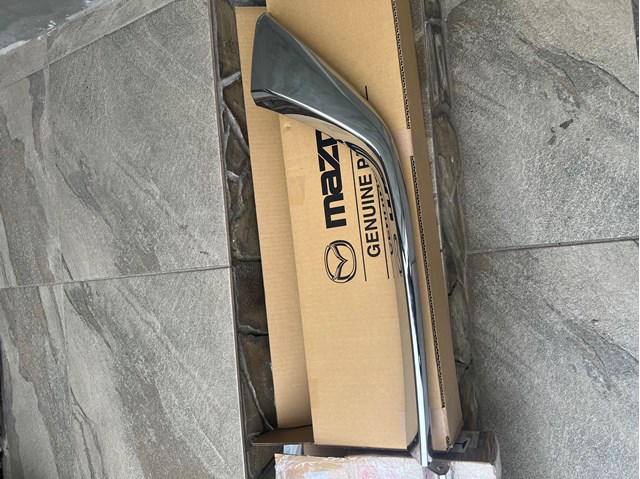 Купить KSD4507K0 Mazda Молдинг решетки радиатора левый