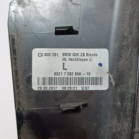 7382959 BMW Накладка под задний фонарь левый