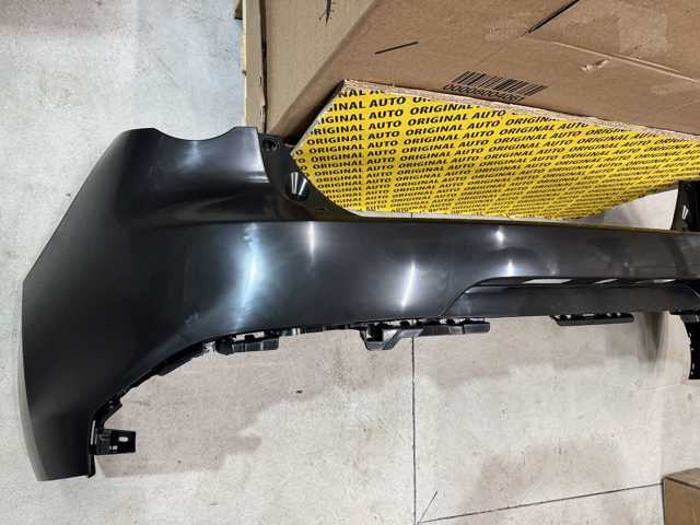 Бампер задний Mazda B0S150221BB