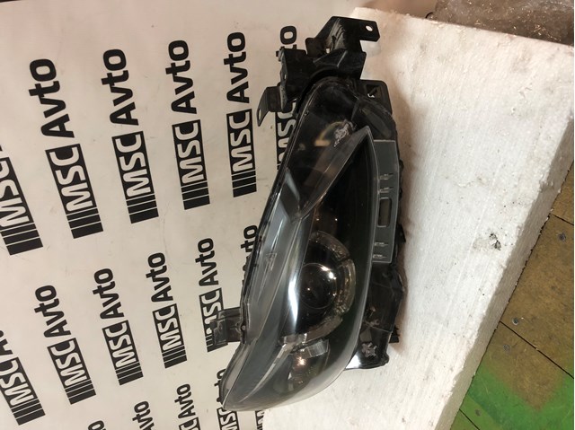 Правая фара GMG951031E Mazda
