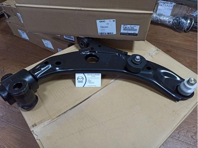 Передний нижний рычаг Mazda TC3M34300A