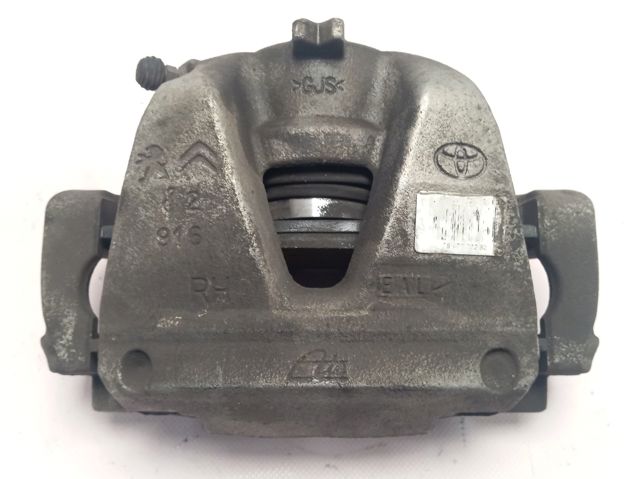 SU001A3126 Toyota Суппорт тормозной, передний, правый