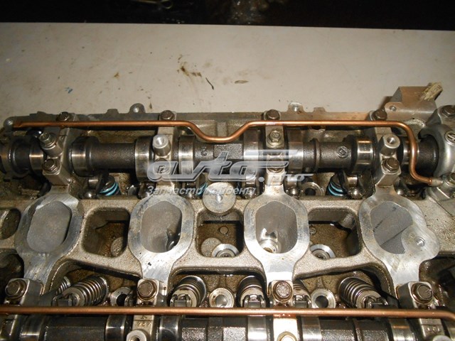 Купить PE0110100B Mazda ГБЦ  двигателя