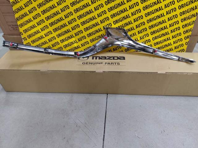 Купить GSH7507J0D Mazda Молдинг решетки радиатора правый