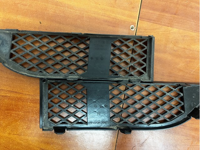 Rejilla de ventilación, parachoques trasero, izquierda 51117135563 BMW