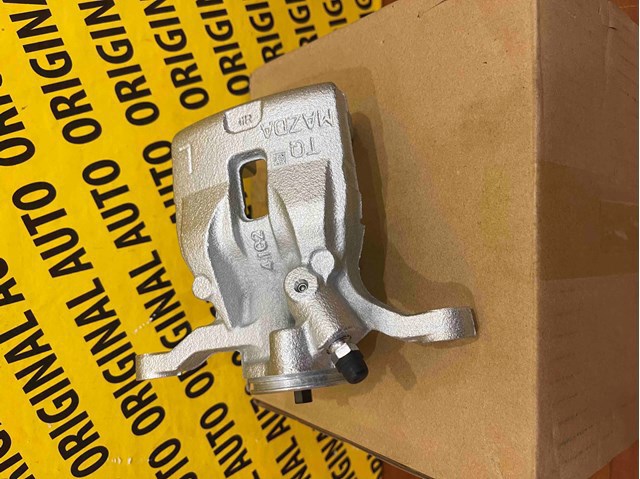 KAY02671XA Mazda Тормозной суппорт задний левый