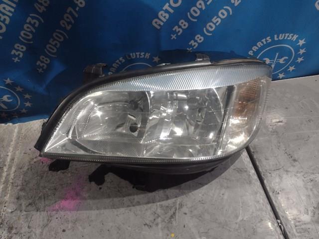Левая фара 90582021 Opel