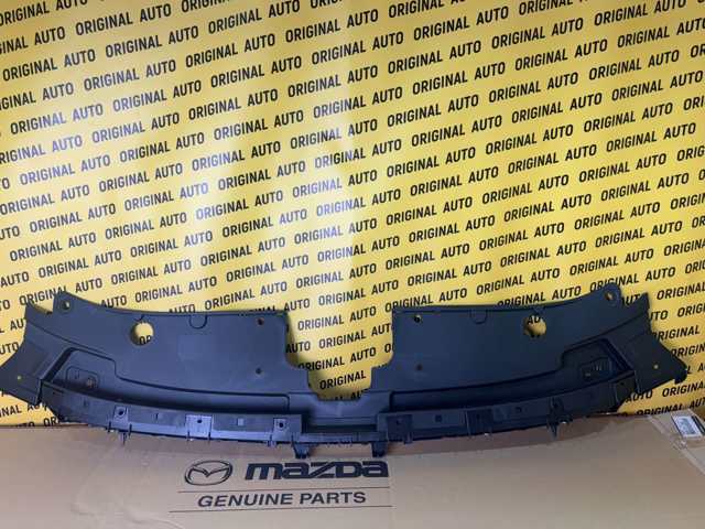 Накладка передней панели (суппорта радиатора) верхняя TK4850720E Mazda