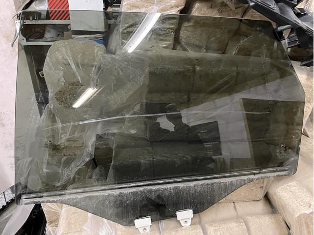 Стекло заднее левое Mazda KB8C735109D