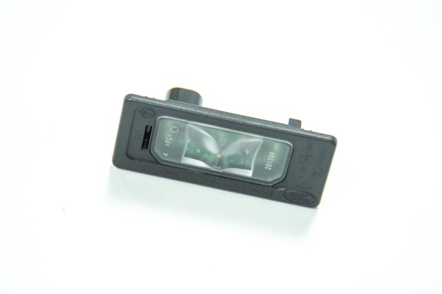 Фонарь подсветки номерного знака LR087728 Land Rover