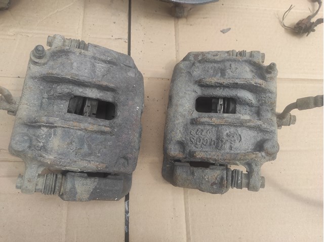 Суппорт тормозной передний левый NISSAN 410117F000