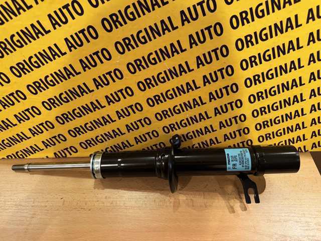 Стойка передняя правая Mazda KJK334700