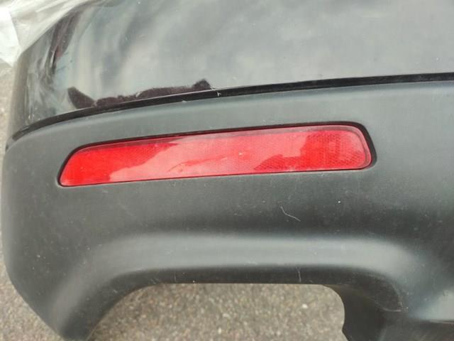 Retrorrefletor (refletor) do pára-choque traseiro esquerdo para Mazda CX-9 (TB)