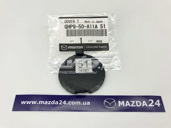 GHP950A11A51 Mazda Передняя заглушка бампера буксировочного крюка