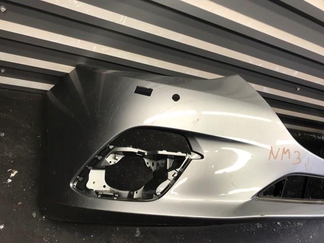 Передний бампер BHN150031ABB Mazda
