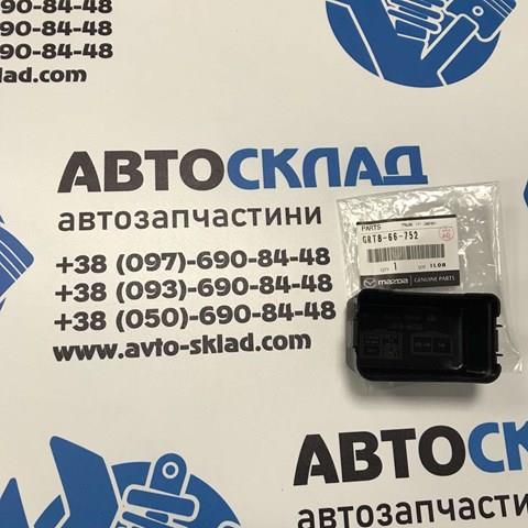 Купить GRT866752 Mazda Крышка блока реле