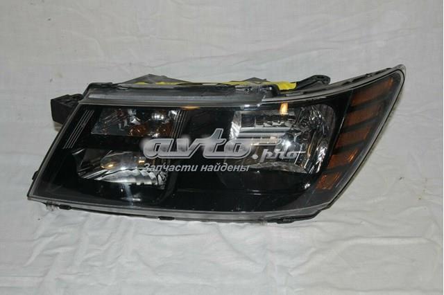 Левая фара 68200085AA Chrysler