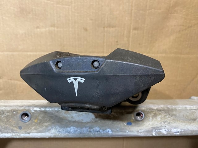 Купить 102125200F Tesla Суппорт задний правый