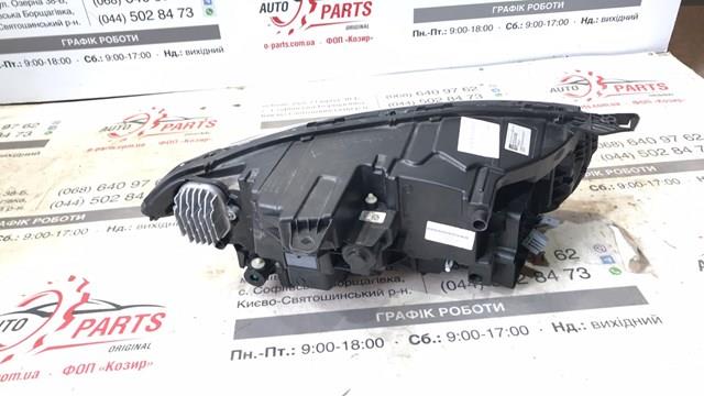 Левая фара 31655721 Volvo