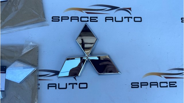Эмблема на решетку радиатора Mitsubishi 7415A738 цена, от 24.00 USD