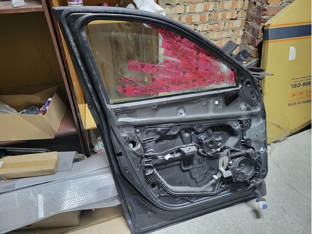 KBY05902XE Mazda Водительская дверь