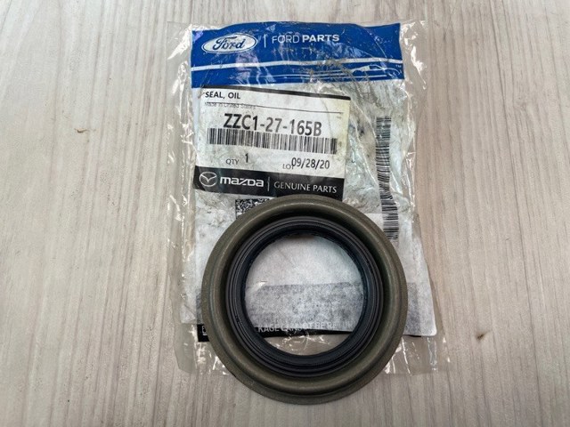 Купить ZZC127165 Mazda Сальник раздаточной коробки передний выходной