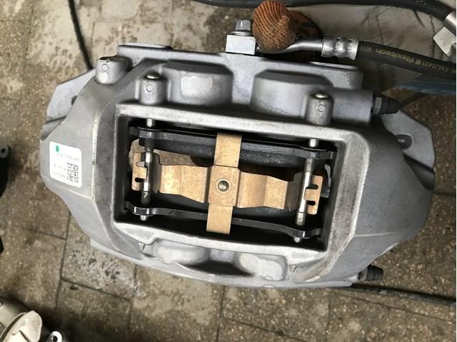 Тормозной суппорт Tesla 104462200D цена, от 31.41 USD