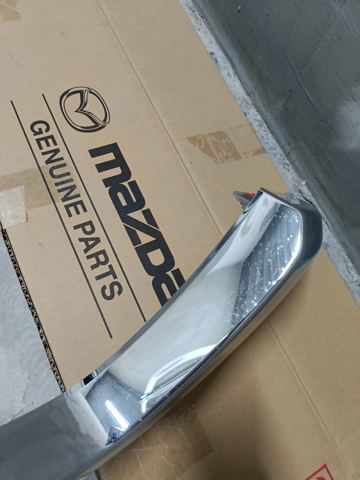 Купить KSD4507K0 Mazda Молдинг решетки радиатора левый