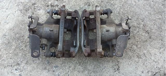 1843320 Ford Суппорт тормозной задний правый