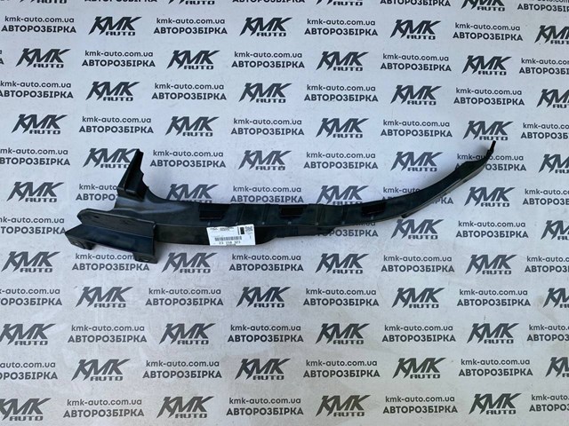 Кронштейн бампера переднего левый 23158323 General Motors