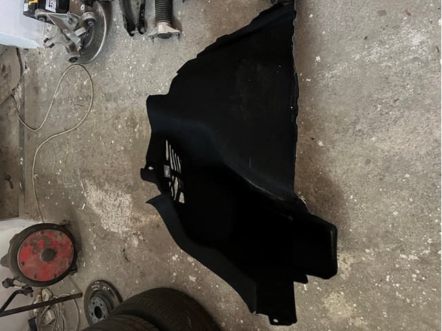 108293200K Tesla Облицовка багажного отсека левая
