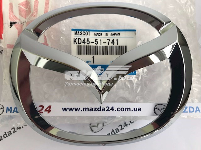 Эмблема решетки радиатора KD4551741 Mazda