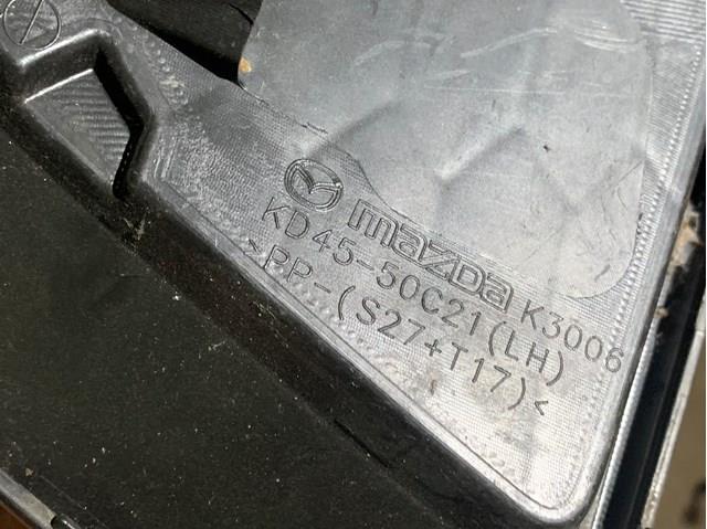 Решетка противотуманных фар левая Mazda KD4550C21