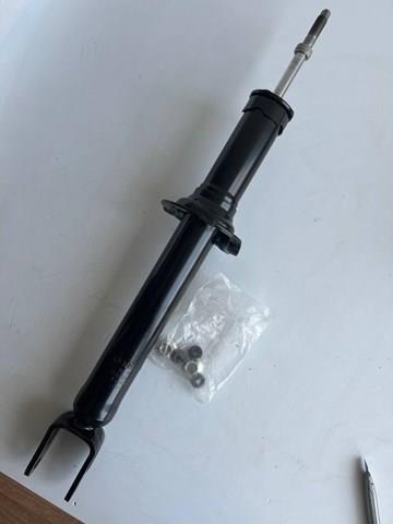 Купить E61104GD0C Nissan/Infiniti Амортизатор передней подвески