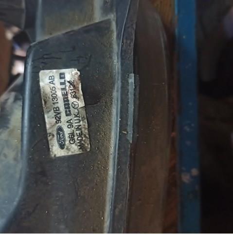 Стекло фары правой FORD 92VB13005AB