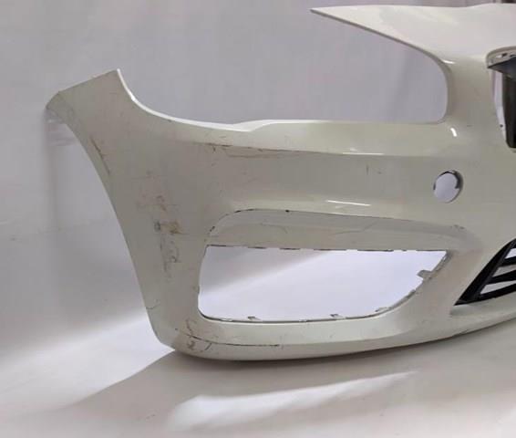 Передний бампер 51117347014 BMW