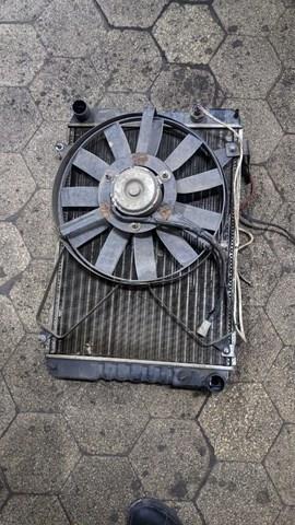 21410VL100 NISSAN Radiador original y equivalente