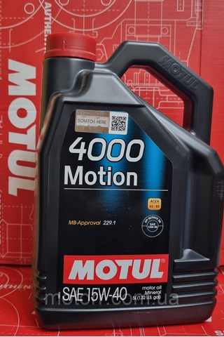 386406 Motul Масло двигателя